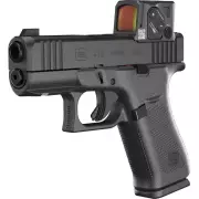 glock-43x-a-cut-s-kolimatorem-aimpsoint-coa.webp